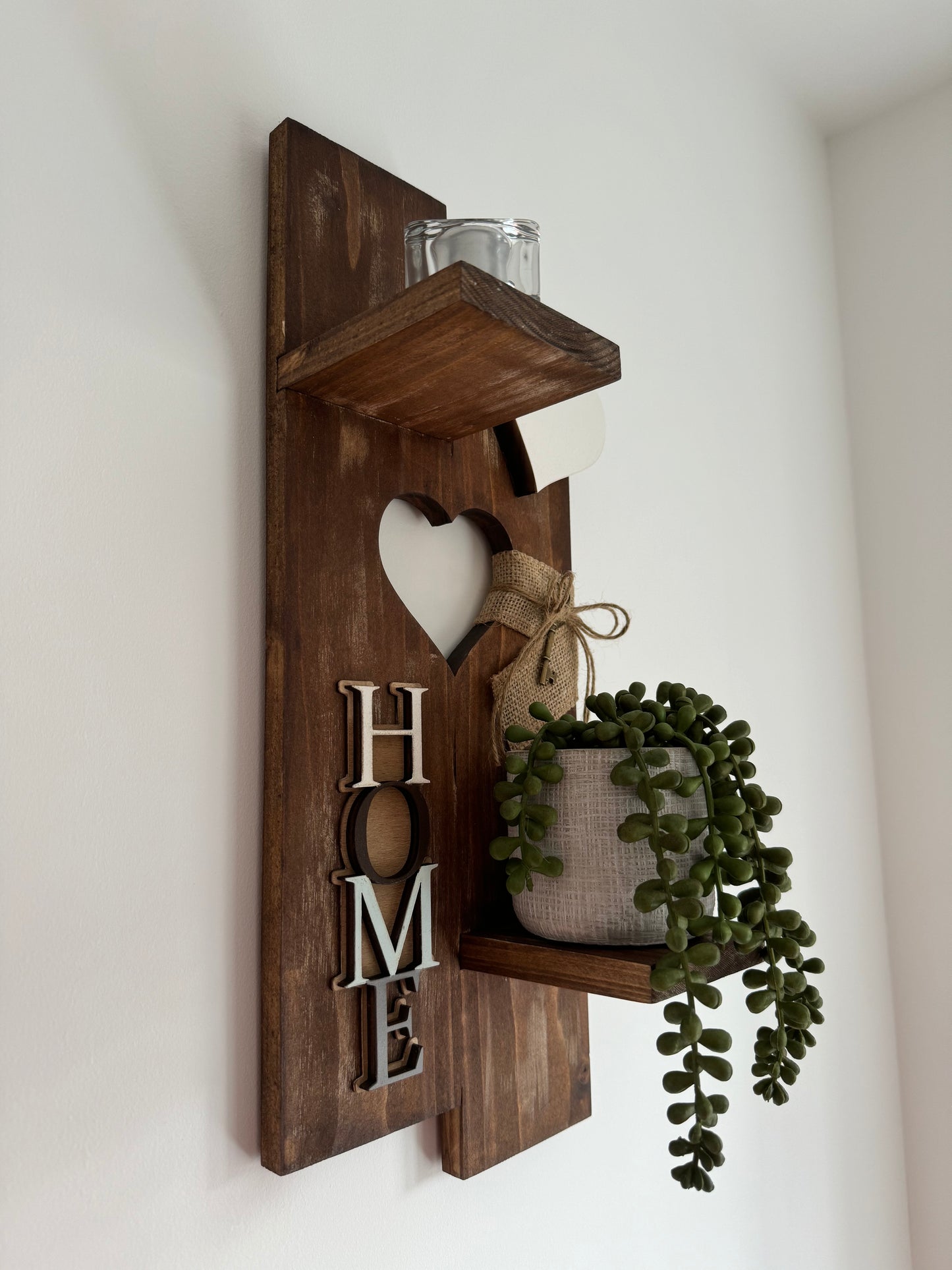 Shelf with HOME Sign